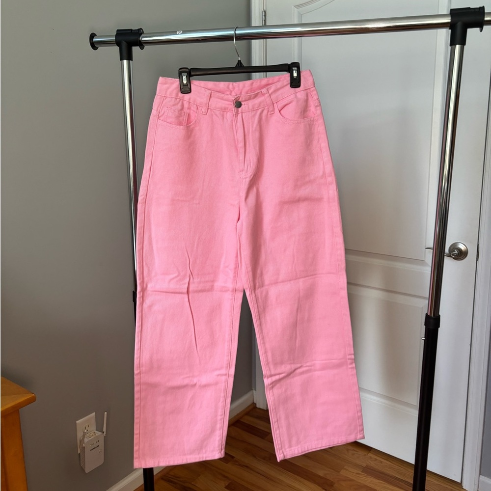 Pink high-waisted jeans